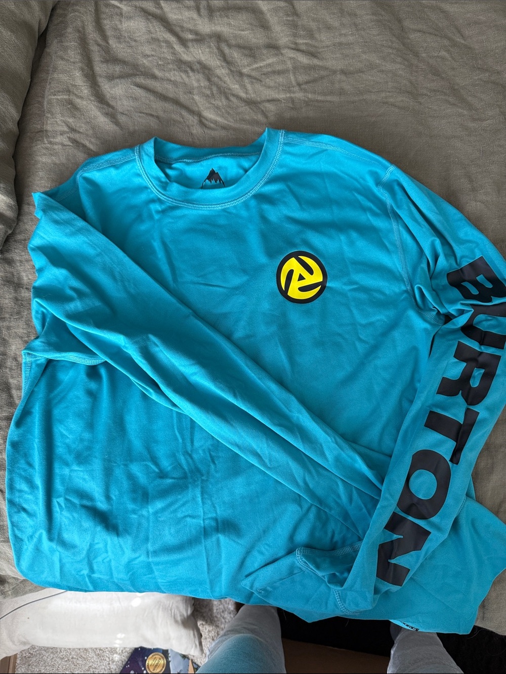 Burton Bright Teal Long Sleeve Shirt with Yellow Chest Emblem